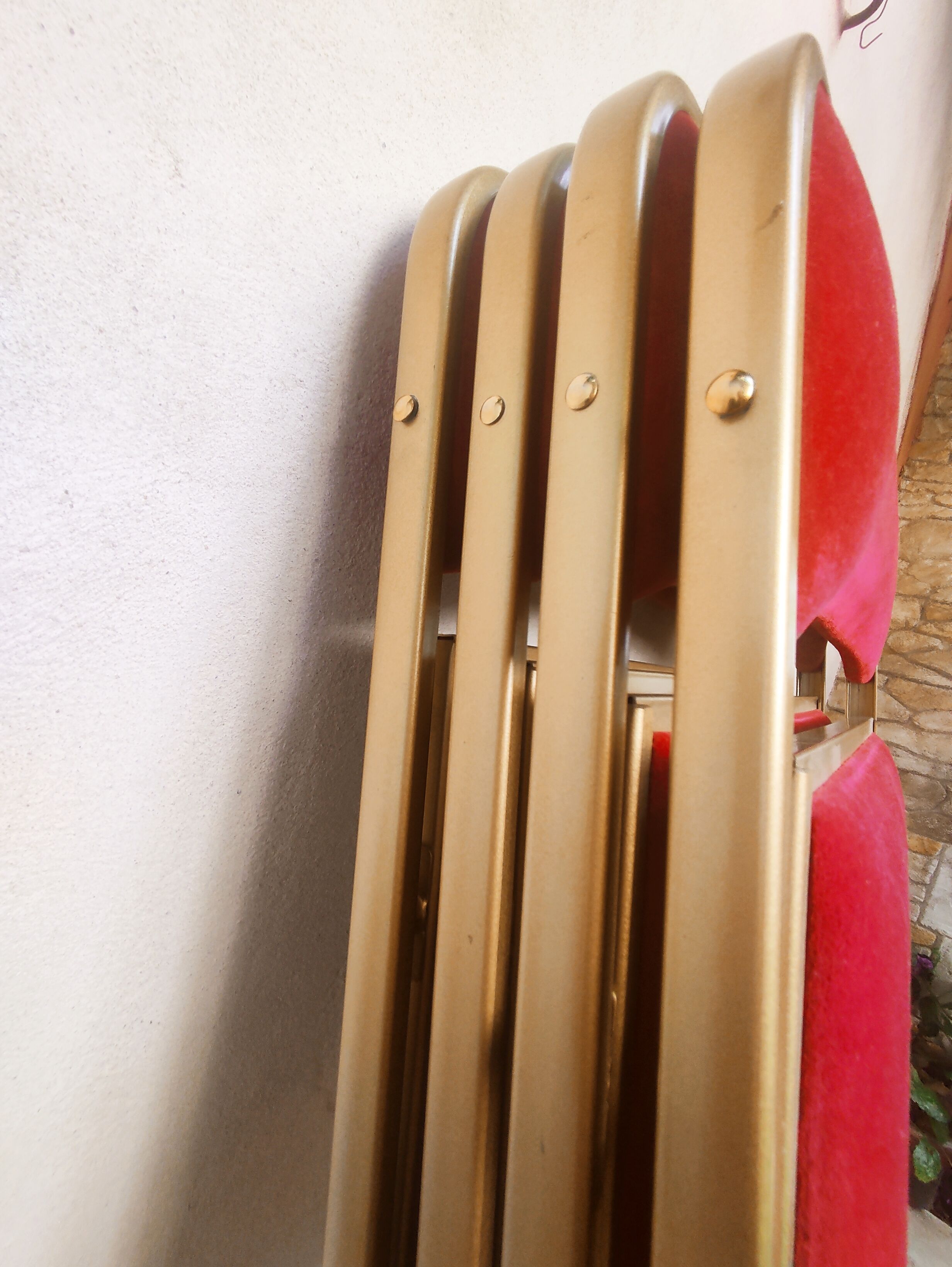 4 golden foldable chairs in scarlet velvet
