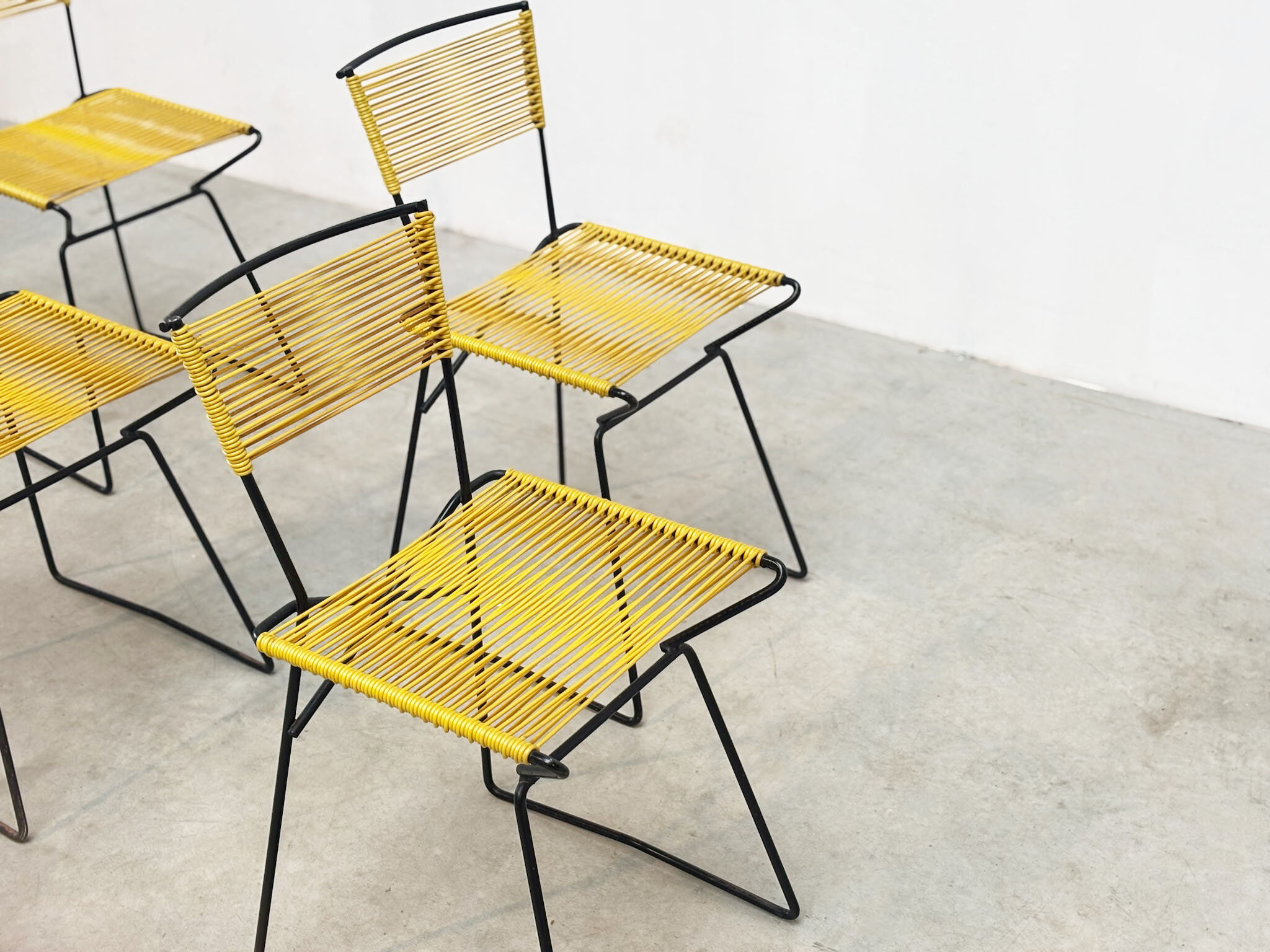 Set of six 'Spaghetti' dining chairs