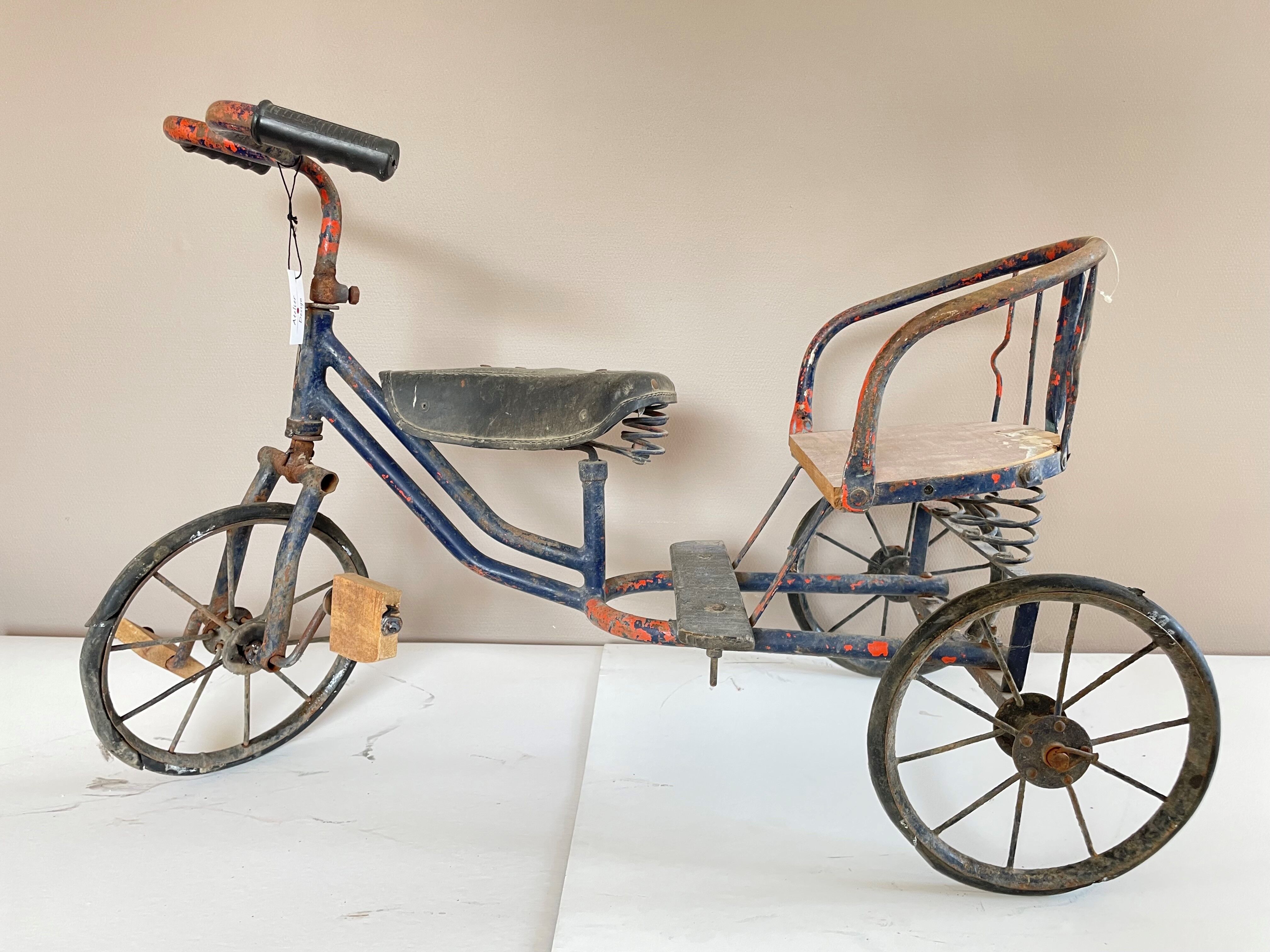 Vintage two-seater antique tricycle