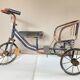 Vintage two-seater antique tricycle