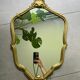 Miroir coquille doré