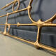 Architectural brutalist wall mounted sculpture made from cast metal.