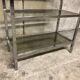 Design in metal chrome and smoked glass shelf