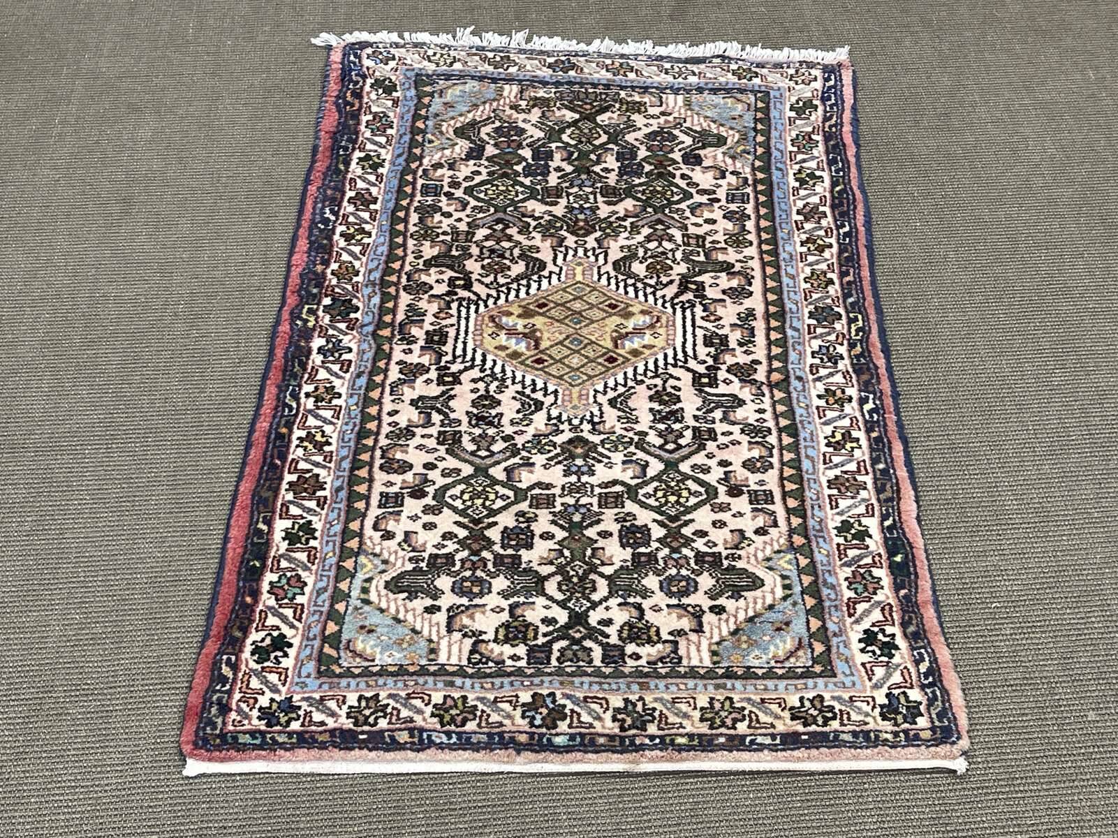 Handmade wool Iranian rug - 1.25m x 0.75m