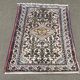 Handmade wool Iranian rug - 1.25m x 0.75m