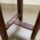 Antique tripod wooden stool, brutalist, wabi sabi style
