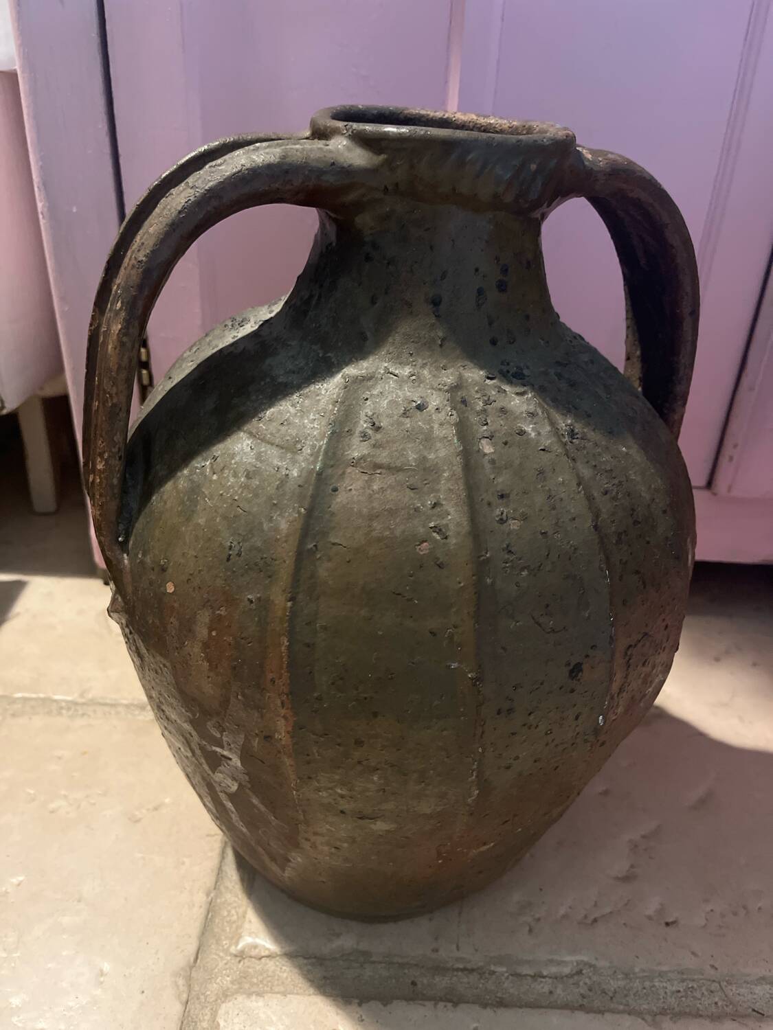 Antique jug with a very patina