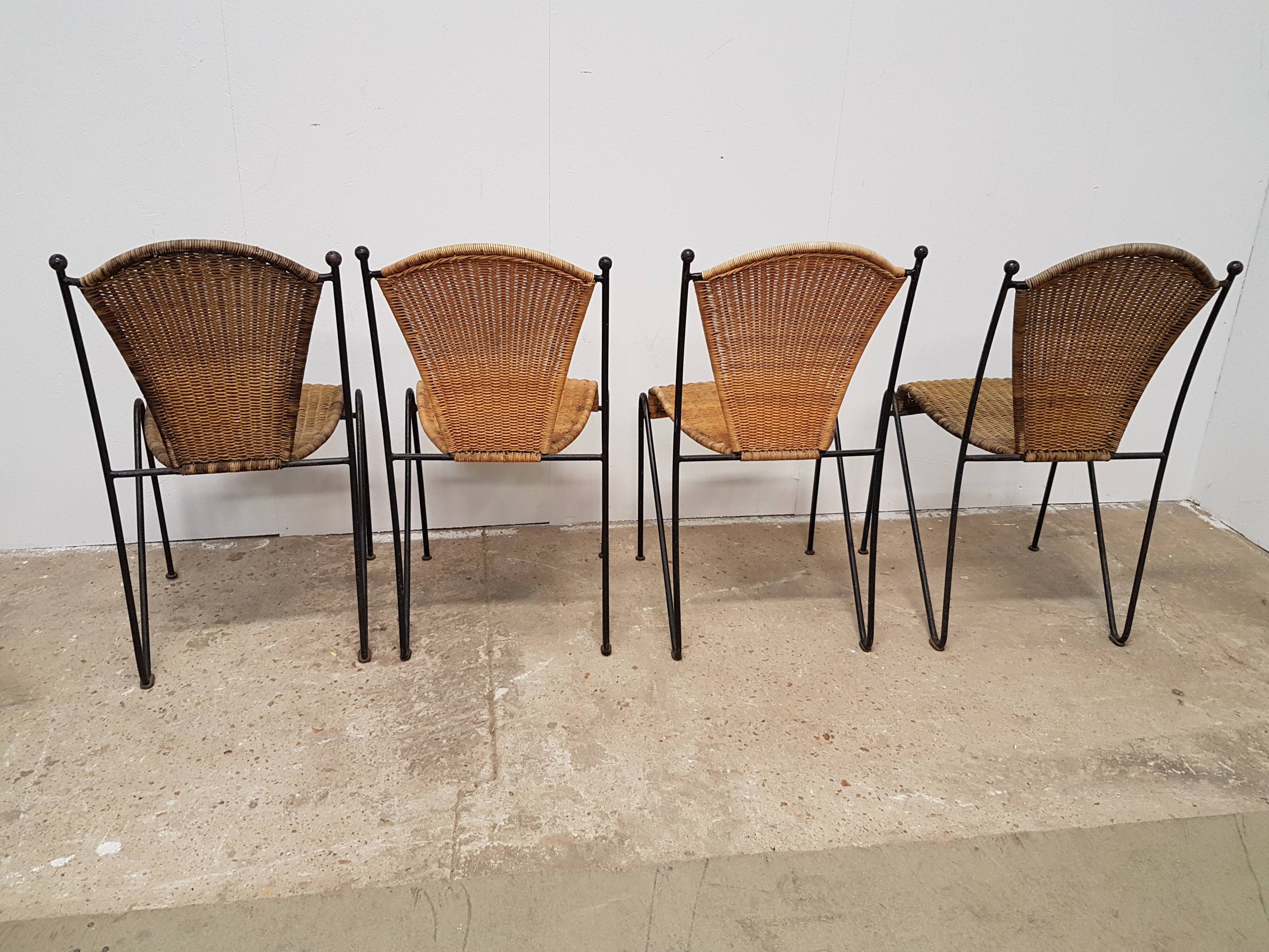 Vintage wicker and black steel chair