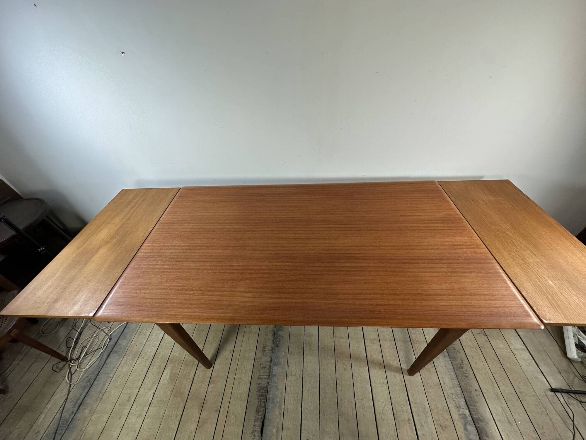Vintage Scandinavian teak dining table 1970s – 2 integrated extensions