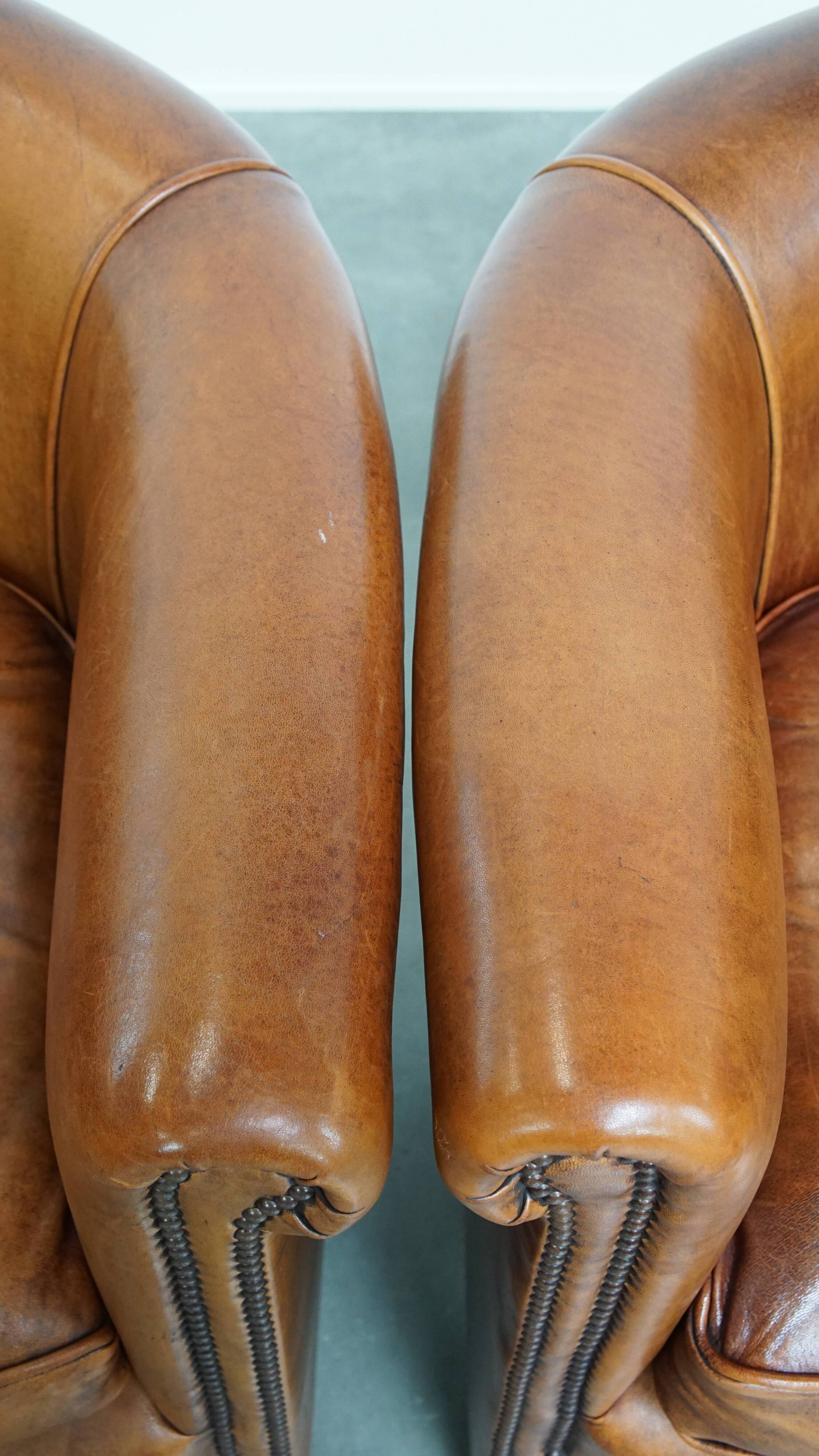 Set of 2 sheepskin leather club chairs