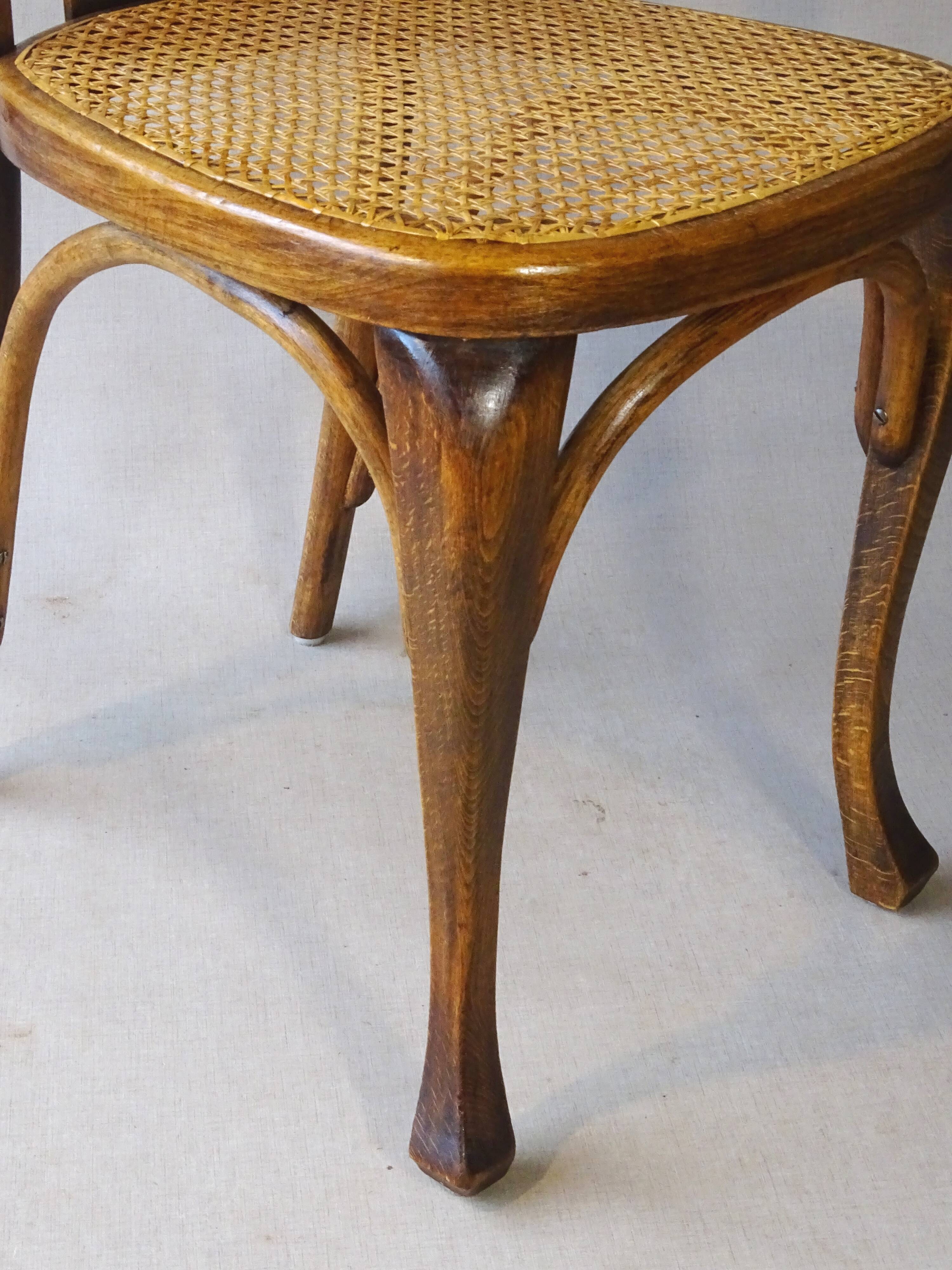 Two Kohn chairs, No. 529, circa 1910, bistro style, caned, bentwood