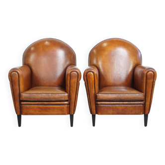Lot de 2 chaises vintage en cuir de mouton