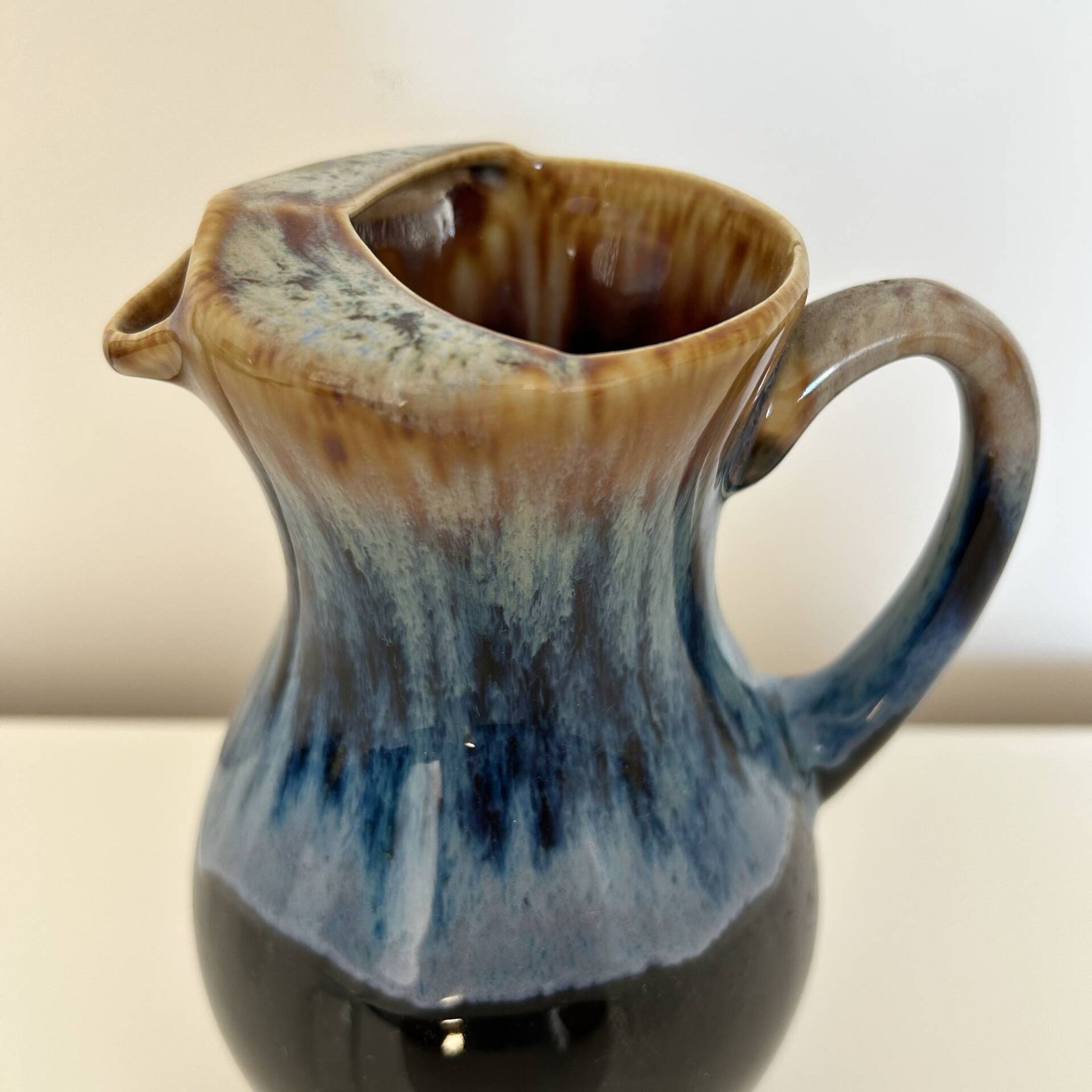 Flamed blue tripod jug