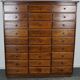 Antique apothecary furniture in oak France early twentieth century