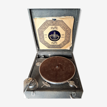 Tourne disque à aiguille des années 1950 avec 7 diques d'époque