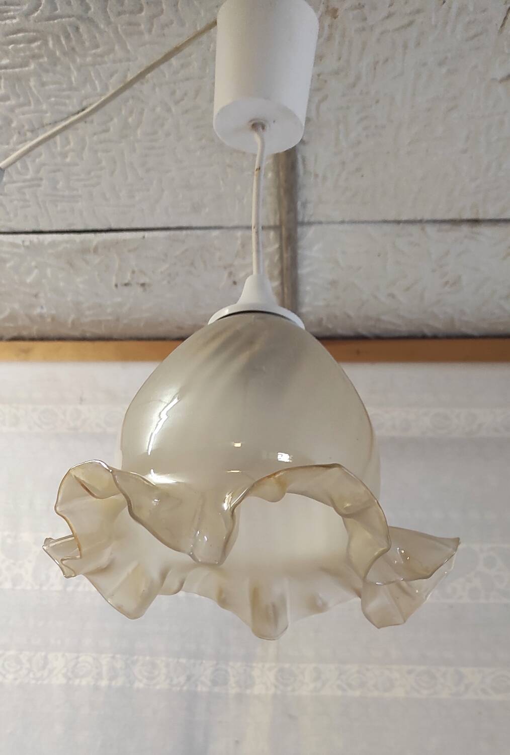 Suspension with opalescent and skirted glass lampshade. Noon. 20th century