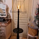 Matte black lamppost with small tablet