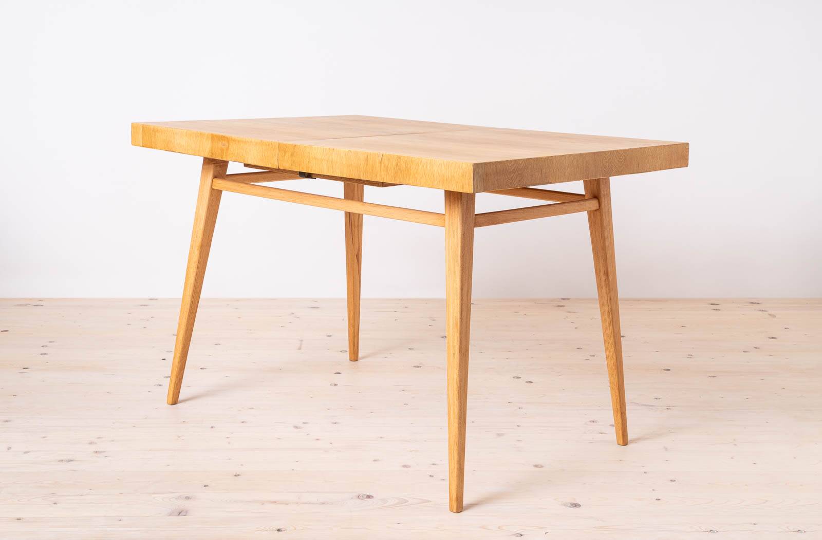 Dining table and 4 chairs by Antonin Šuman, restored.