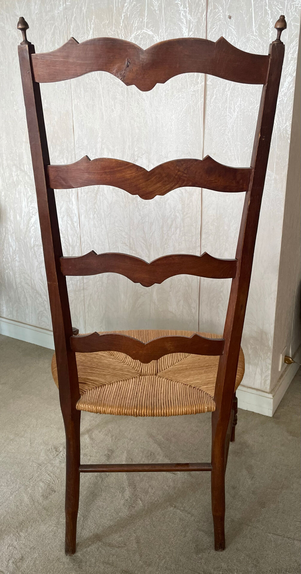 Antique ladderback chair, very high backrest, rush seat.