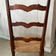 Antique ladderback chair, very high backrest, rush seat.