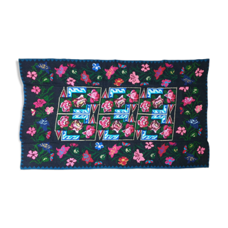 Handwoven floral wool rug, black background with pink roses and geometric design 207x144cm