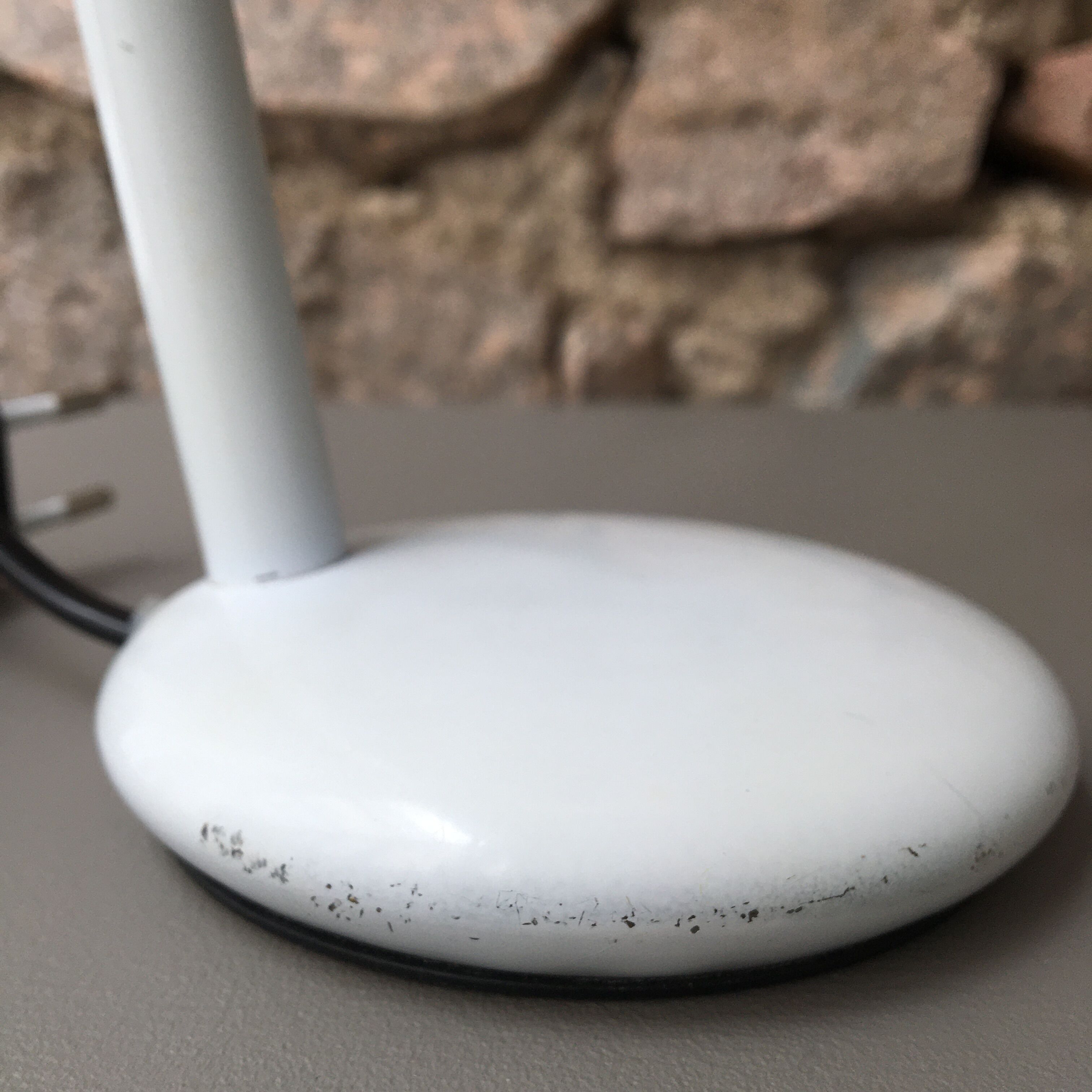 flexible white and stainless steel desk lamp