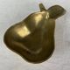Empty pocket ashtray in pear-shaped brass
