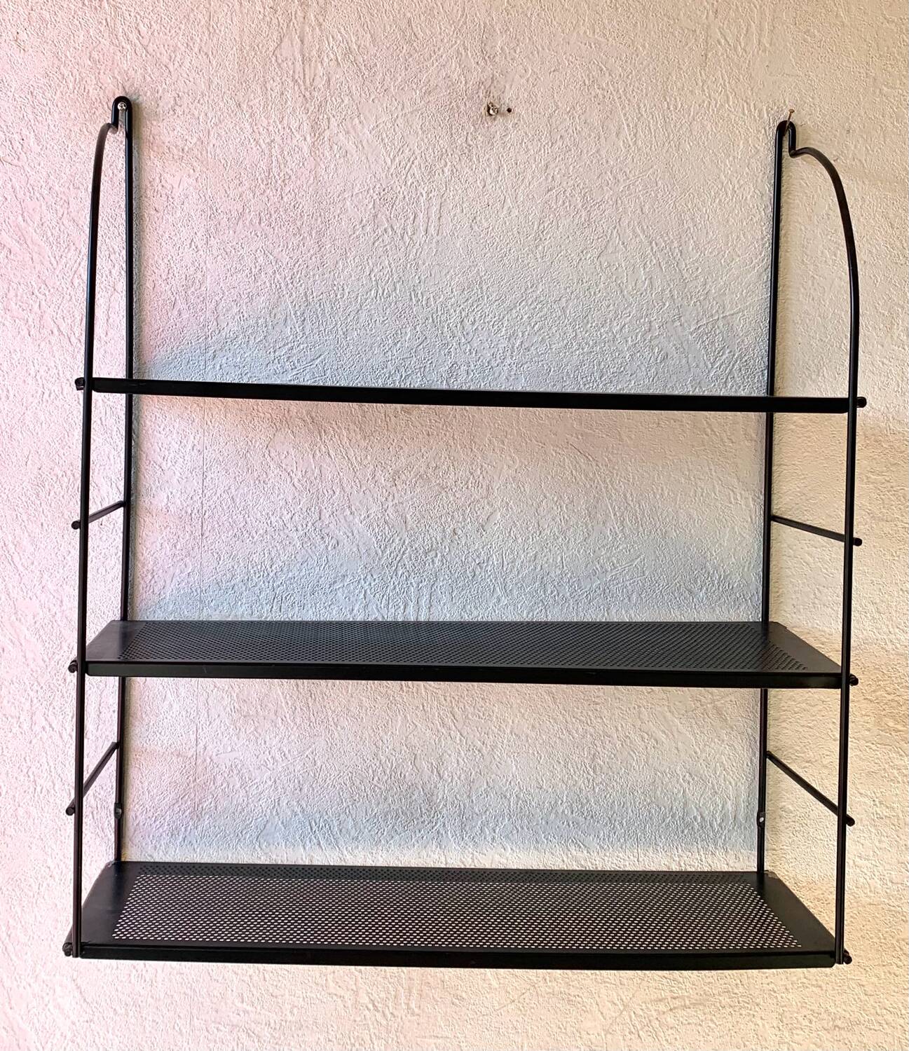 Black metal string shelf