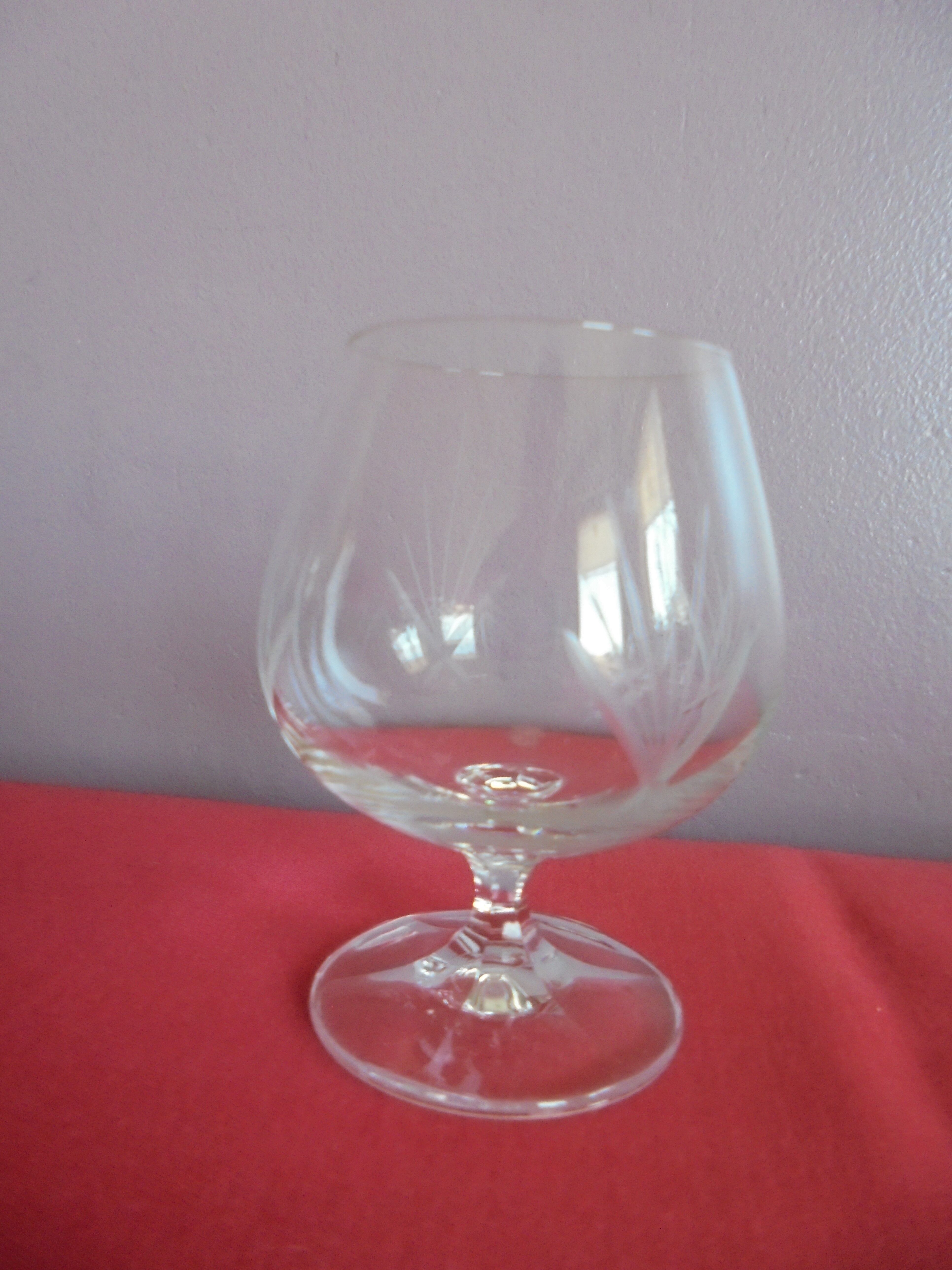 Lot 4 unsigned chiseled crystal cognac glasses