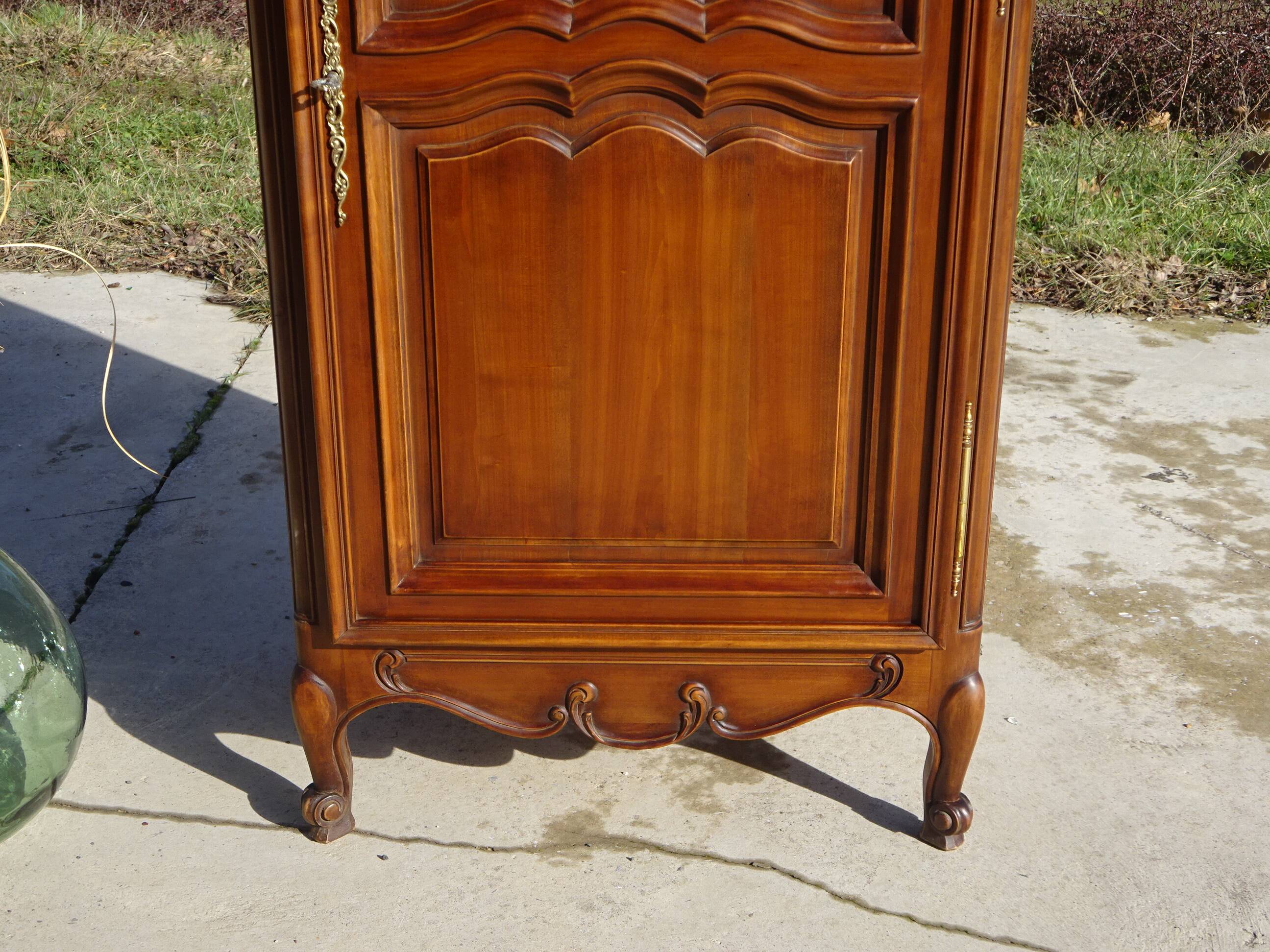 Louis XV style bonnetière in solid cherry wood