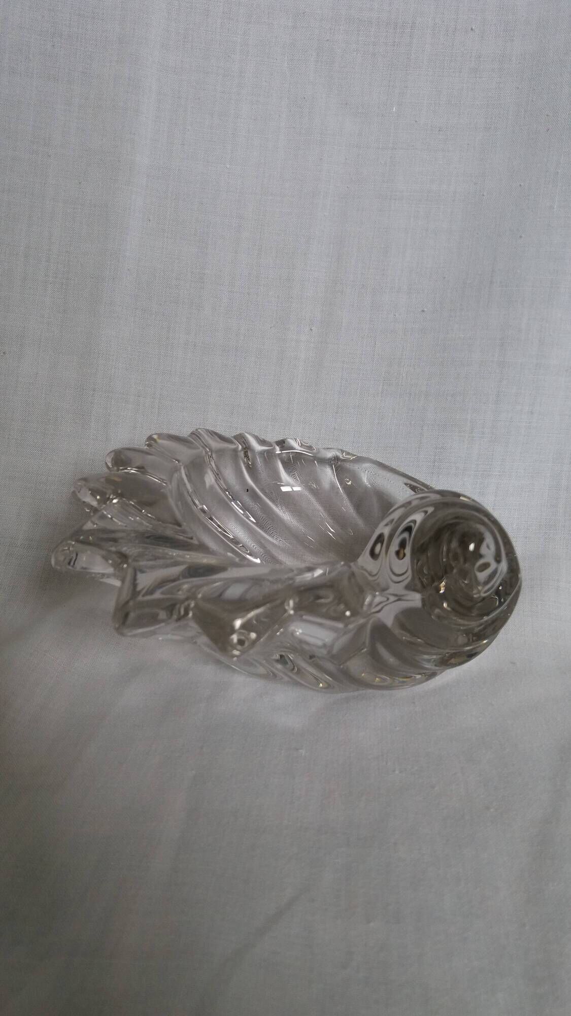Shell-shaped crystal paperweight.