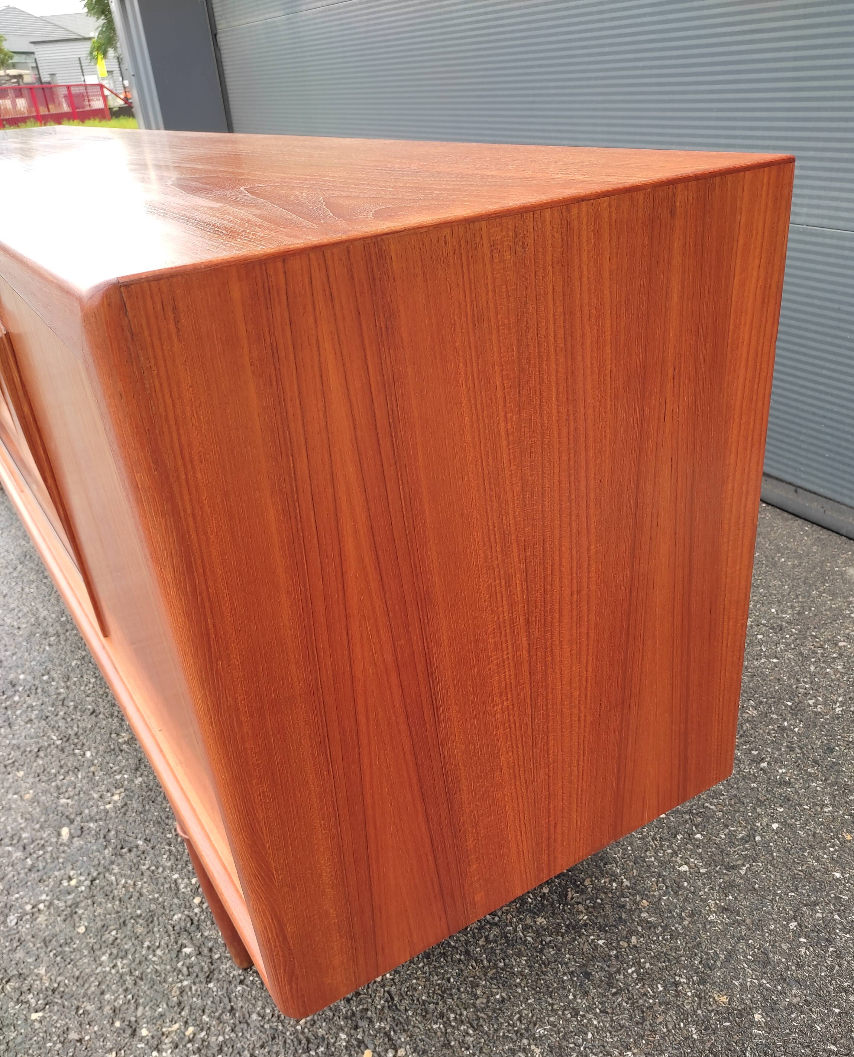 Scandinavian teak row by Axel Christensen for ACO Mobler