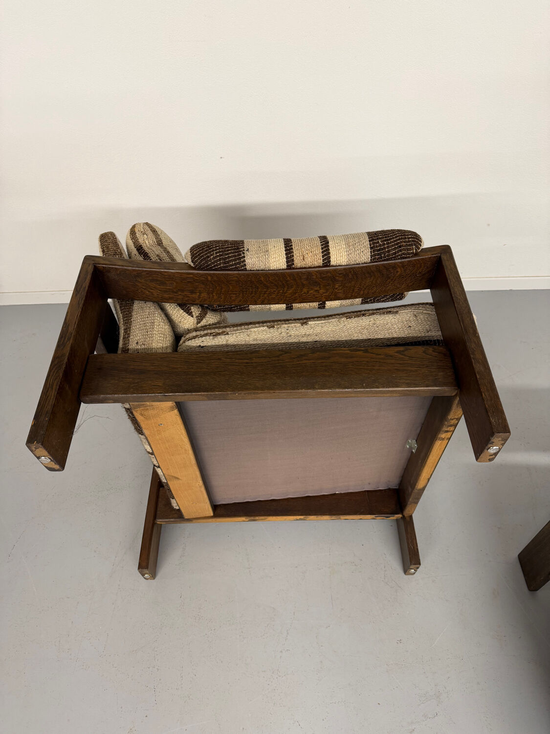 2 vintage 1970s wooden and fabric armchairs