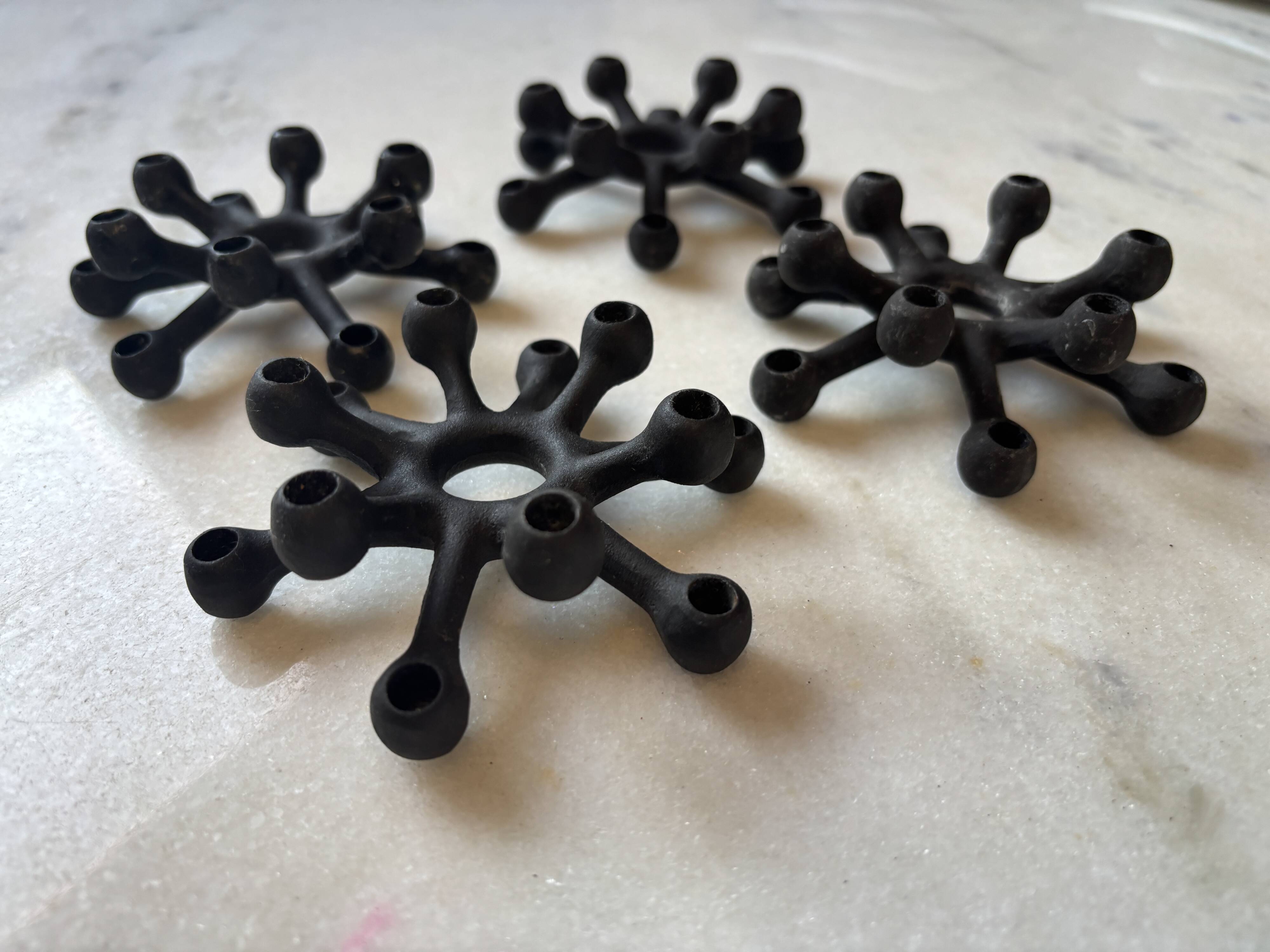 4 "Spider" candle holders by Jens Quistgaard for Dansk Designs, Scandinavian 1960s.