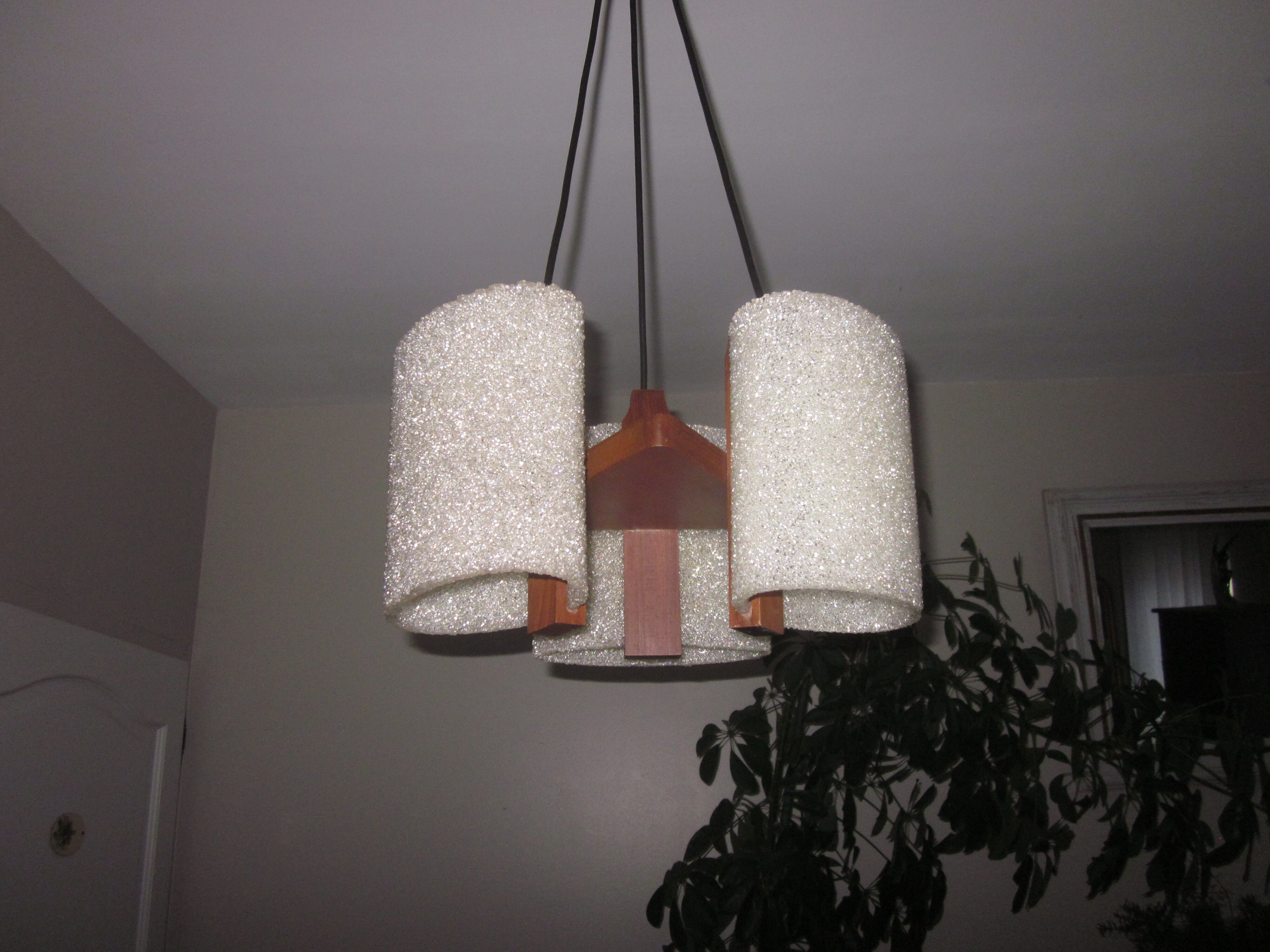 Scandinavian teak chandelier and perplexed