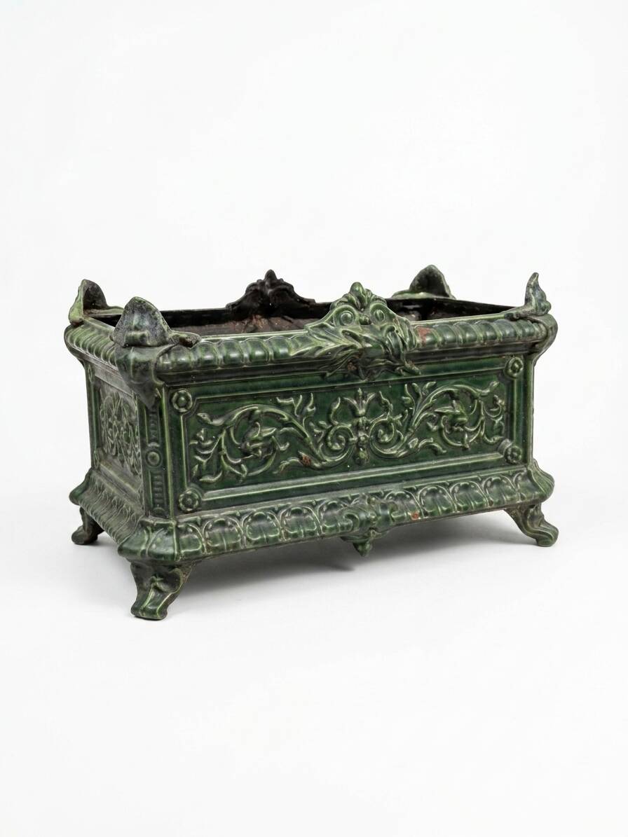 Antique enamelled cast iron planter in the Napoleon III style.