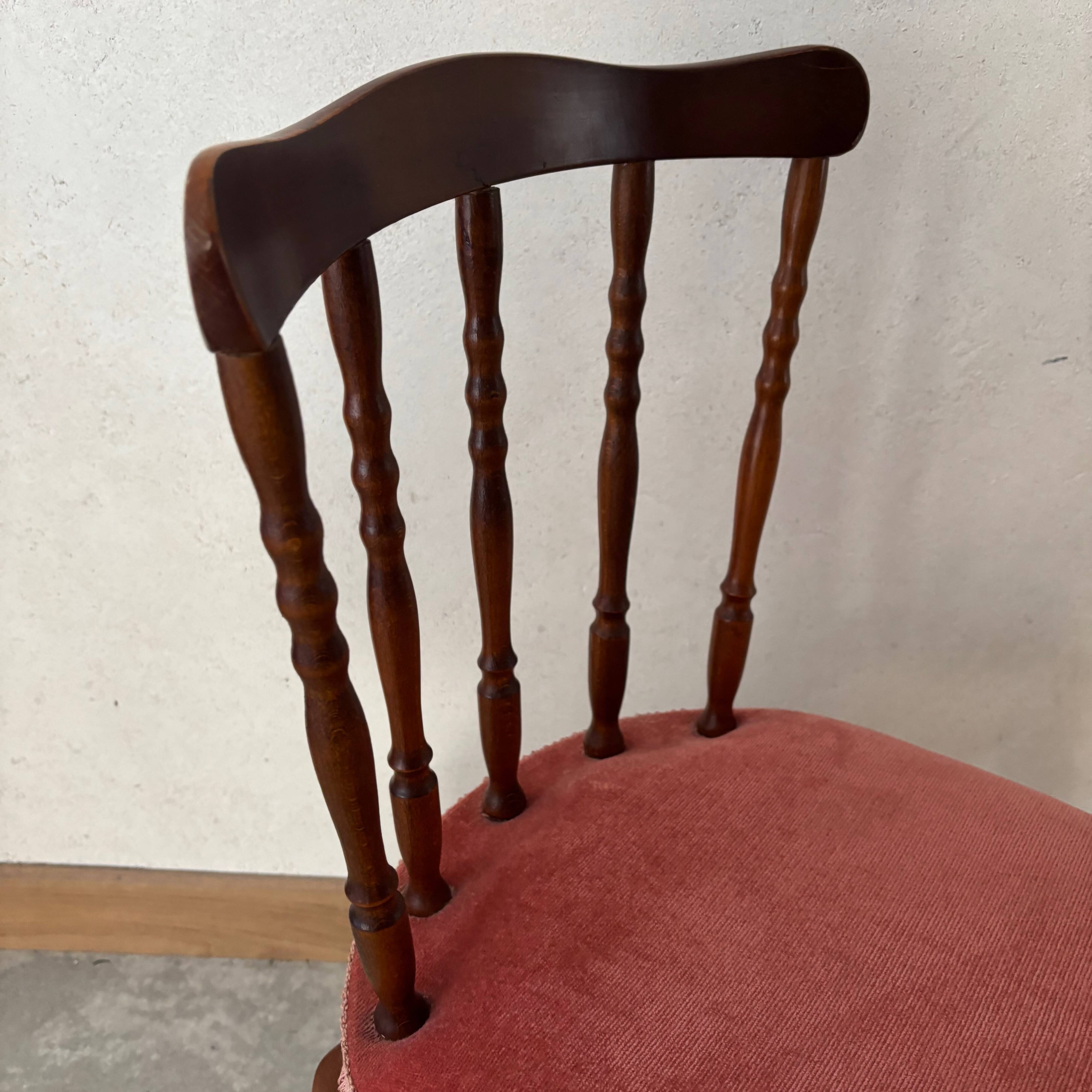 Wooden chair with red velvet