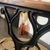 Bistro table with iron legs and raw wood top