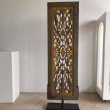 Rectangular Indonesian construction element with blue and yellow plant in carved wood