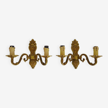 Old pair of double-light brass wall sconces. 60s