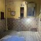 Miroir Louis Philippe ancien doré avec fronton