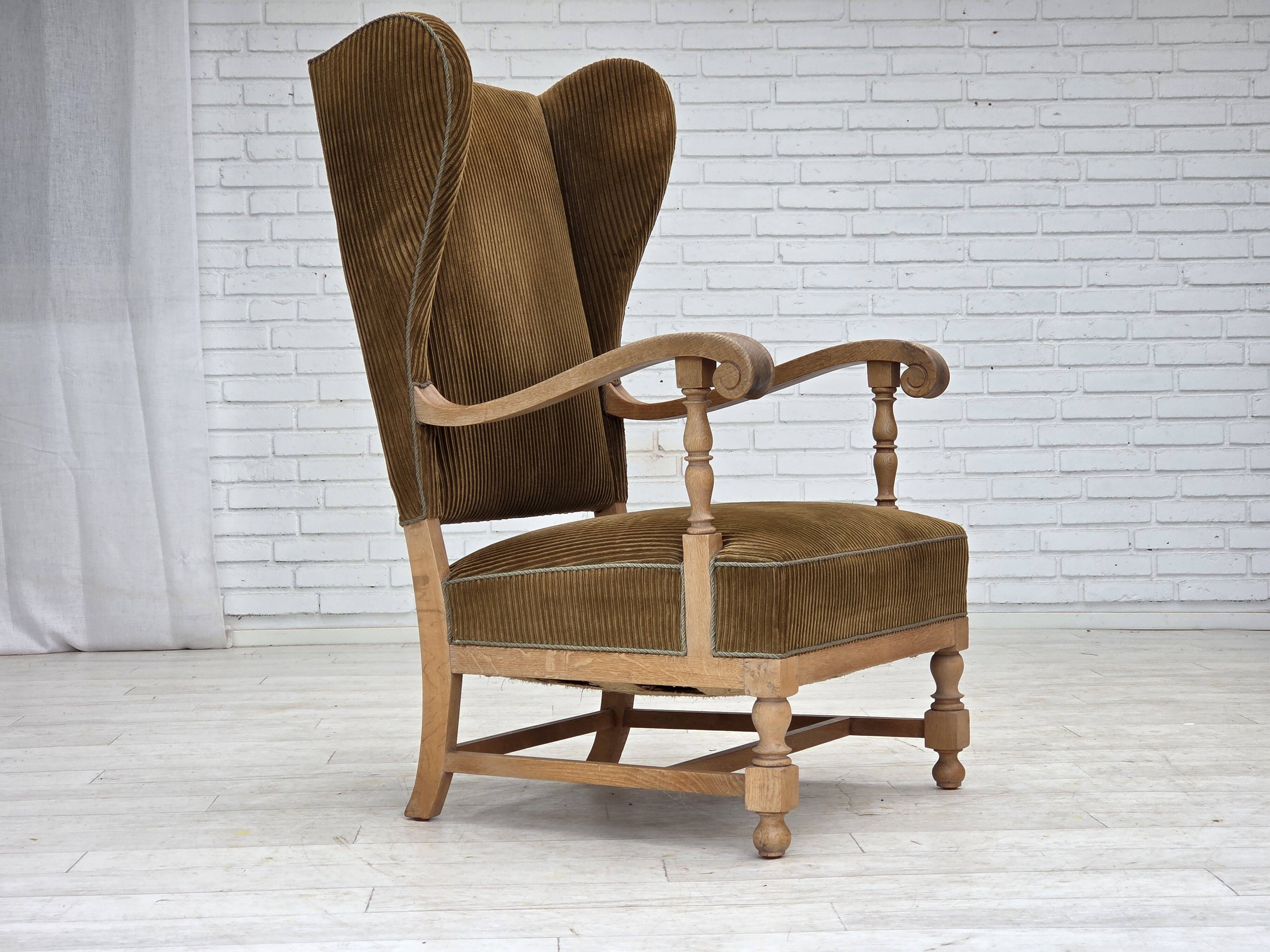 1970s, Scandinavian highback armchair, furniture corduroy, carved oak wood.