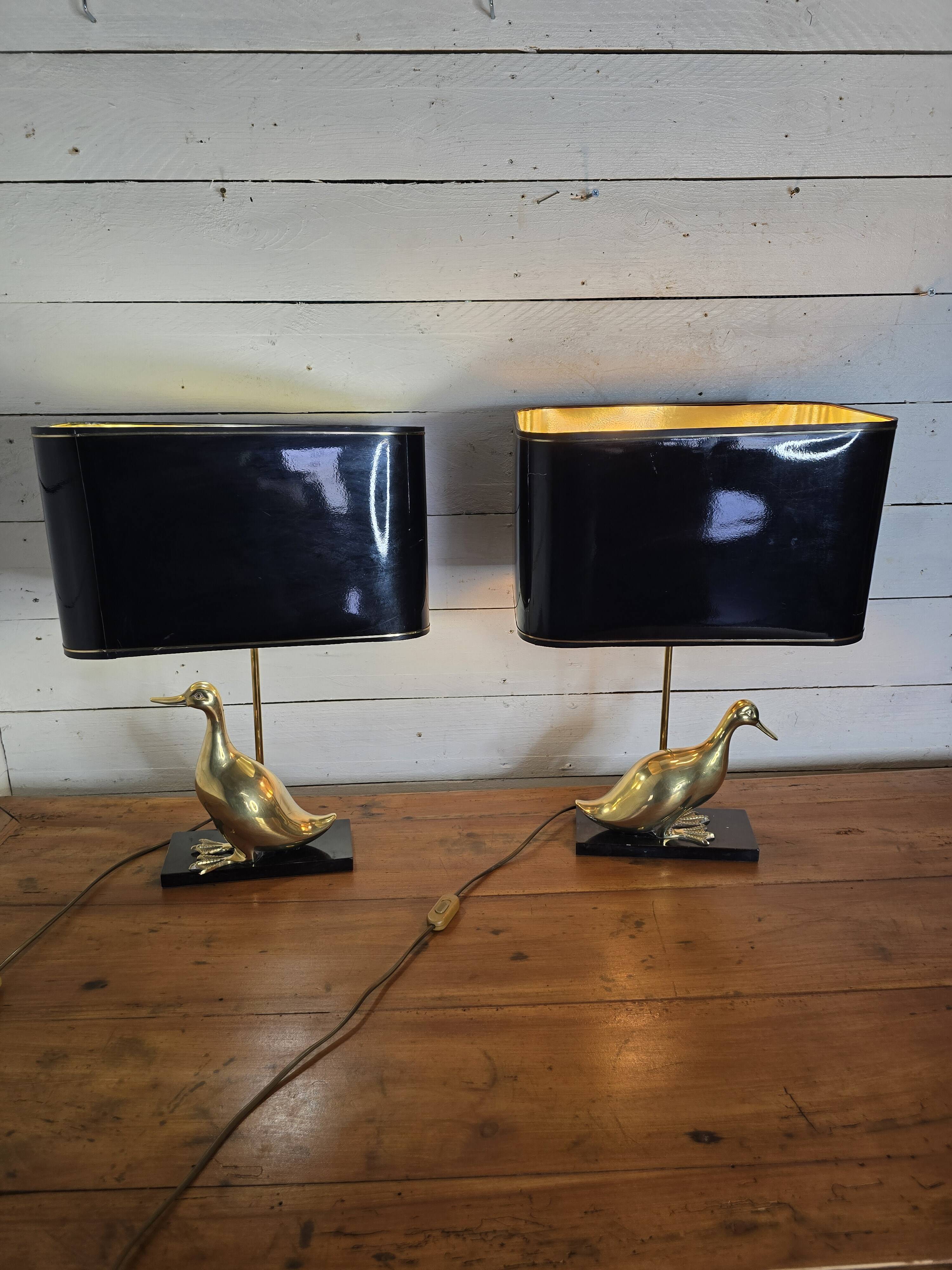 Pair of 70s table lamps featuring a brass duck
