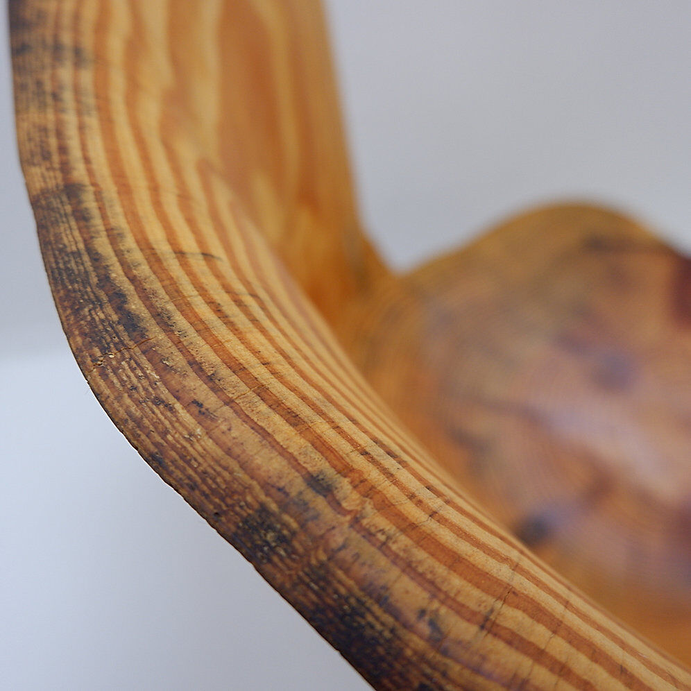 Brutalist sculptural chair in solid oak in wabi-sabi style.