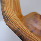 Brutalist sculptural chair in solid oak in wabi-sabi style.