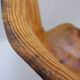 Brutalist sculptural chair in solid oak in wabi-sabi style.