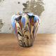 Vase dripping in varnished earth