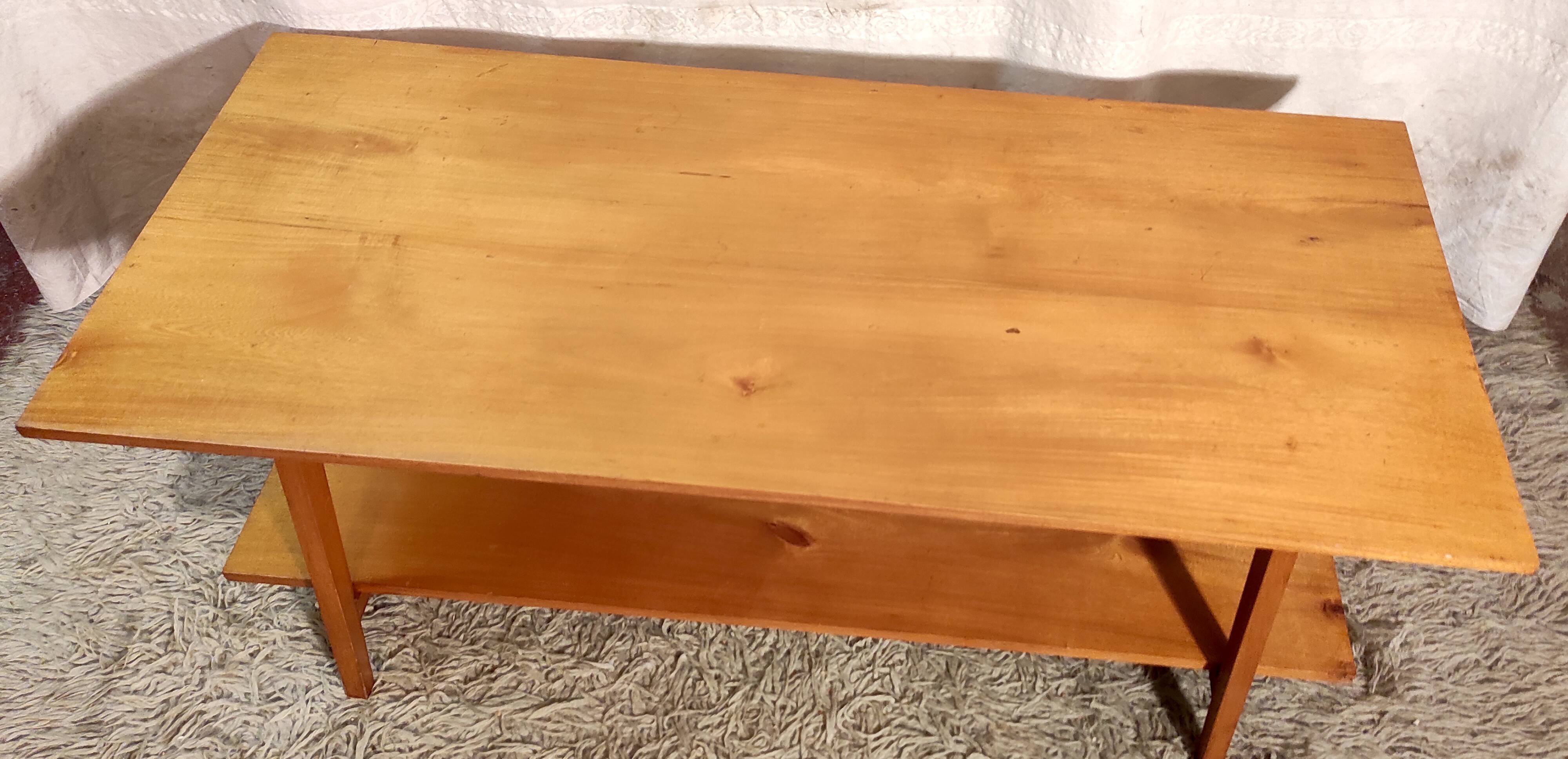 Solid wood coffee table with tapered legs - mid 20th century.