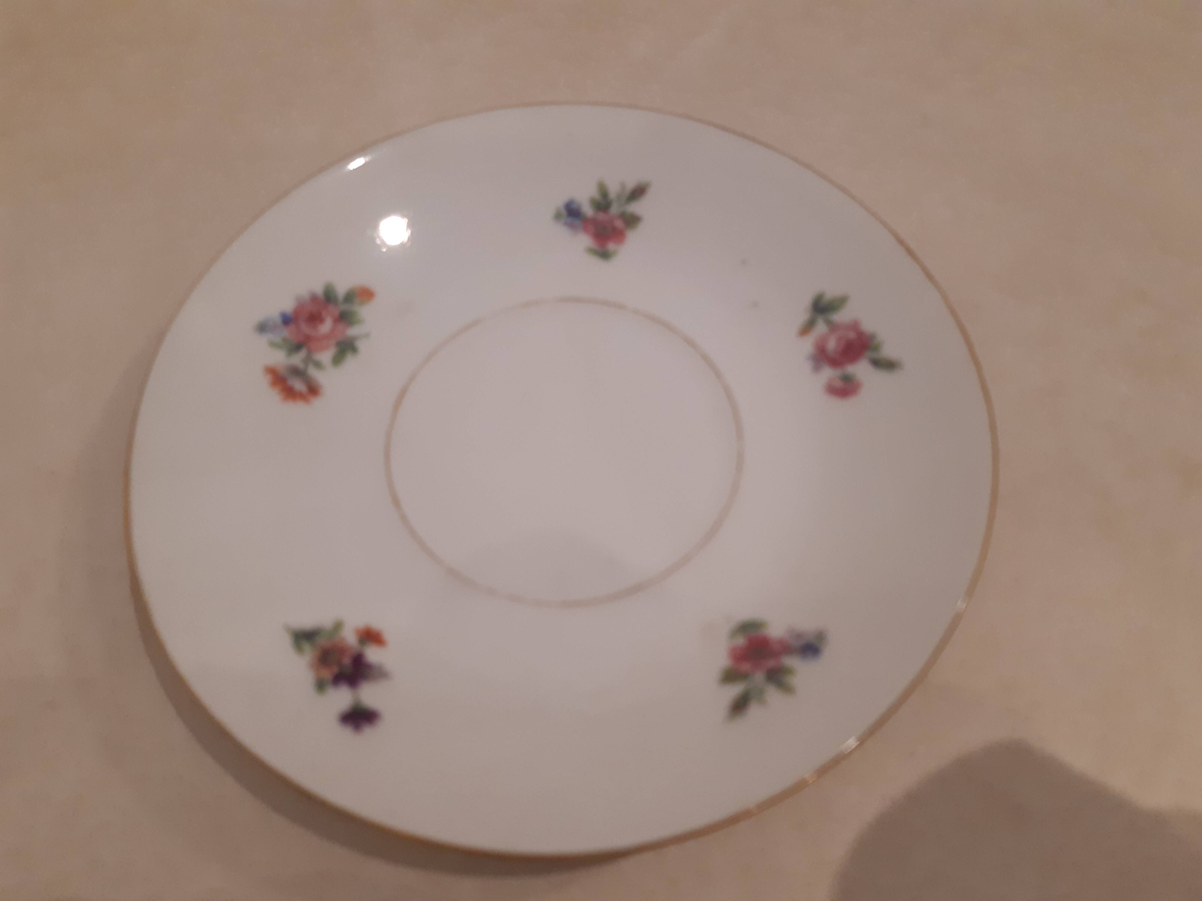 Breakfast set in white porcelain with floral decoration, 1930s.