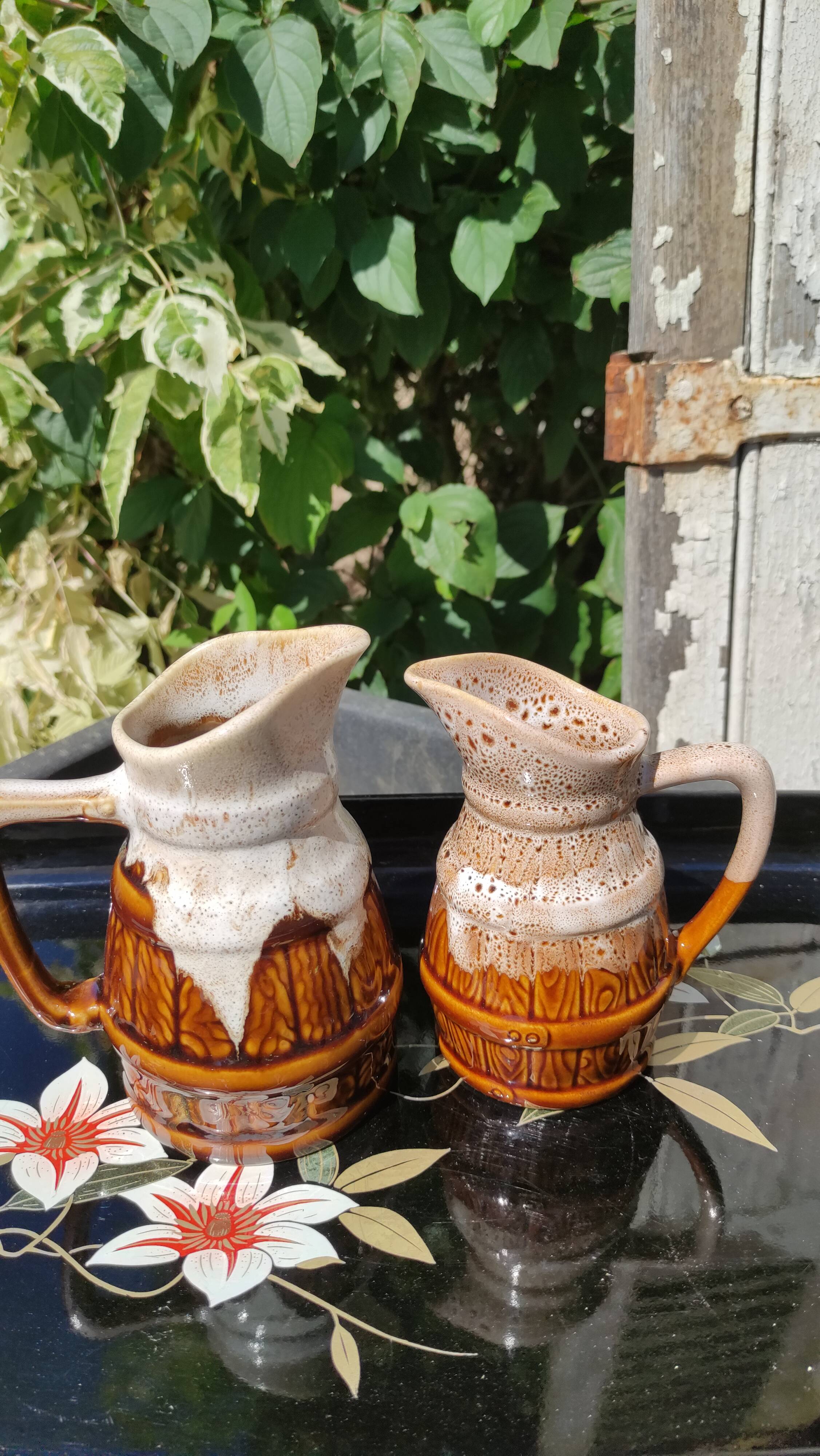 Duo of vintage pitchers Revol